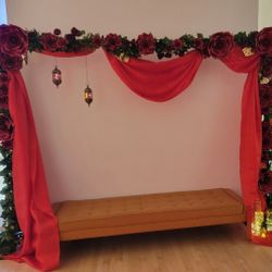 Backdrop Decor Includes Drapery, Garlands And Flowers