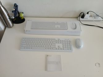 New Microsoft Bluetooth Keyboard and mouse. 
Included batteries. 
Only 30 dollars (on sale for 120 dollars).
Incredible deal