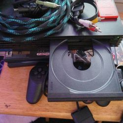 PS2 Gaming System With 2 Controllers, 2 8mb Memory Cards, 6 Games, and all wires