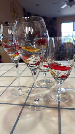 Hand blown wine glasses from Romania with hand, painted patterns like stained glass