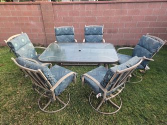 Patio Set Table and 6 swivel chairs