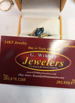 14 Kt real gold& London blue topaz ring