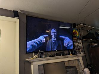 TCL 65-inch 4K UHD HDR Smart Roku TV: