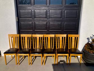 Six wooden Coaster dining chairs