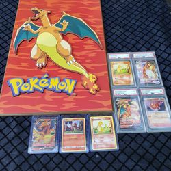 PSA 10 charizard $200!. Pictures frame $200!. All for $700! Pokémon charizard collection cards with frame. $700! Or closer offer