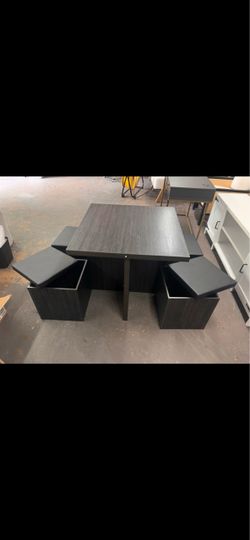 New in box dining table with 4 dining chairs with storages