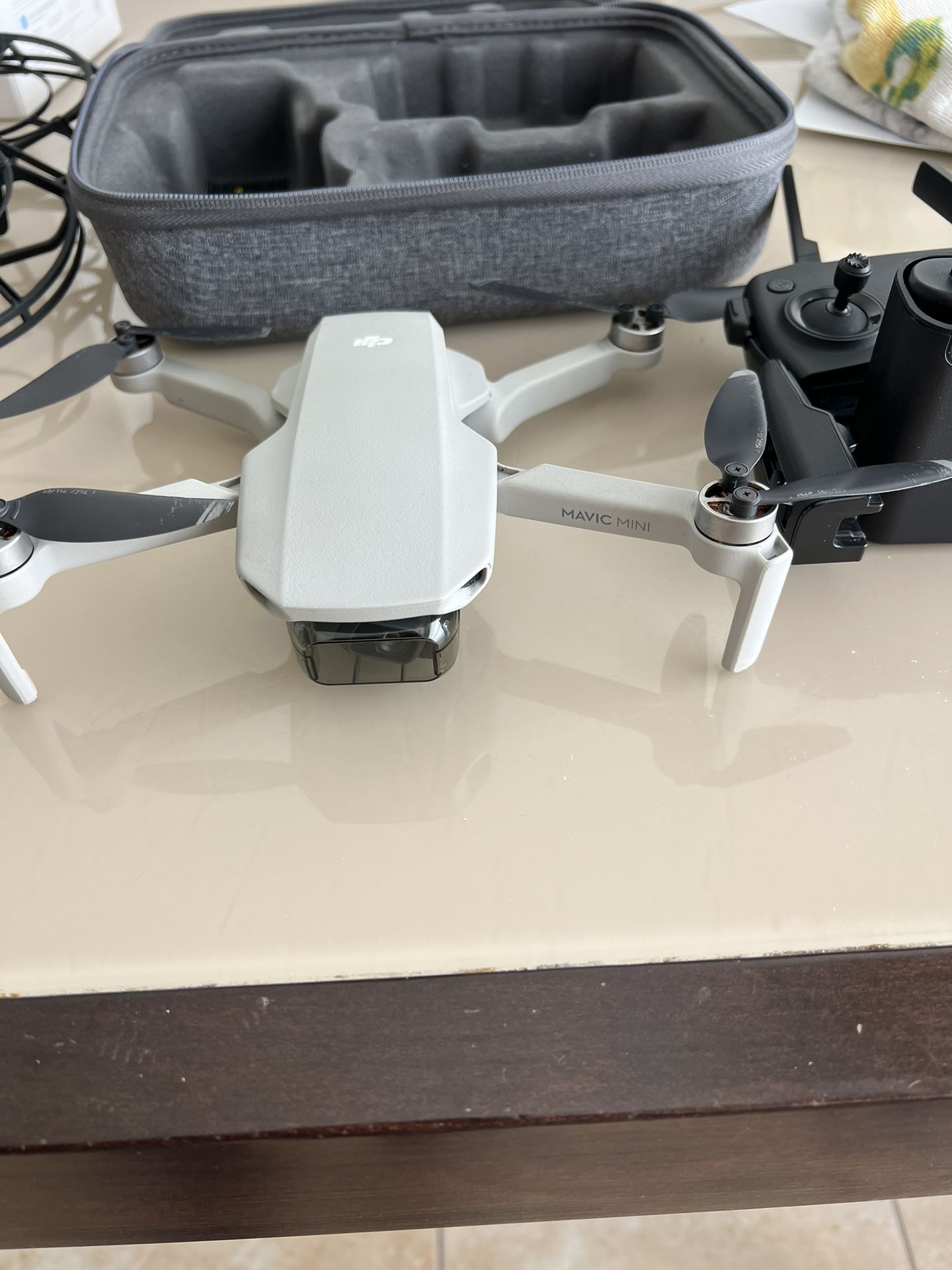 DJI MAVIC MINI WITH THE INFAMOUS FLY MORE COMBO WITH BOX,3 BATTERIES, DRONE, REMOTE, BOX AND ACCESSORIES