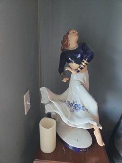 porcelain woman dancing sculpture