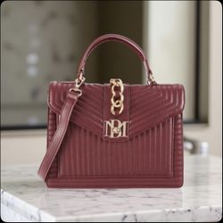 Badgley Mischka Kelly Quilted Crossbody Bag in a wine or burgundy vegan leather finish