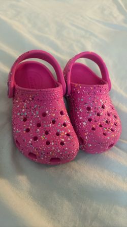 Pink crocs