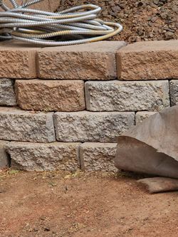 Stacking wall blocks $1.00 each can be delivered for free within 3 miles o additional mile for $1.00 each miles with help to unload it .over 100 piece