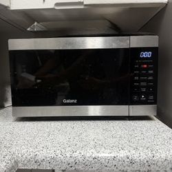 Microwave And Kitchen Items 