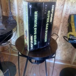 Disco, stand, y quemador