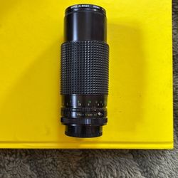 a Super Albinar camera lens.