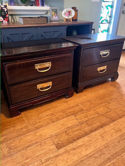 Pair of Dark Wood Nightstands with Brass Handles