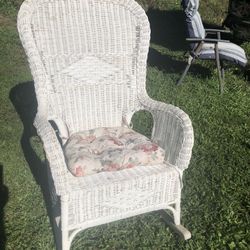 Vintage Wicker Rocking Chair With Seating Cushion.