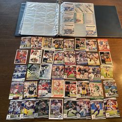 Hundreds of NFL football trading cards in binder Collection Barry Sanders Brett Favre Joe Montana 