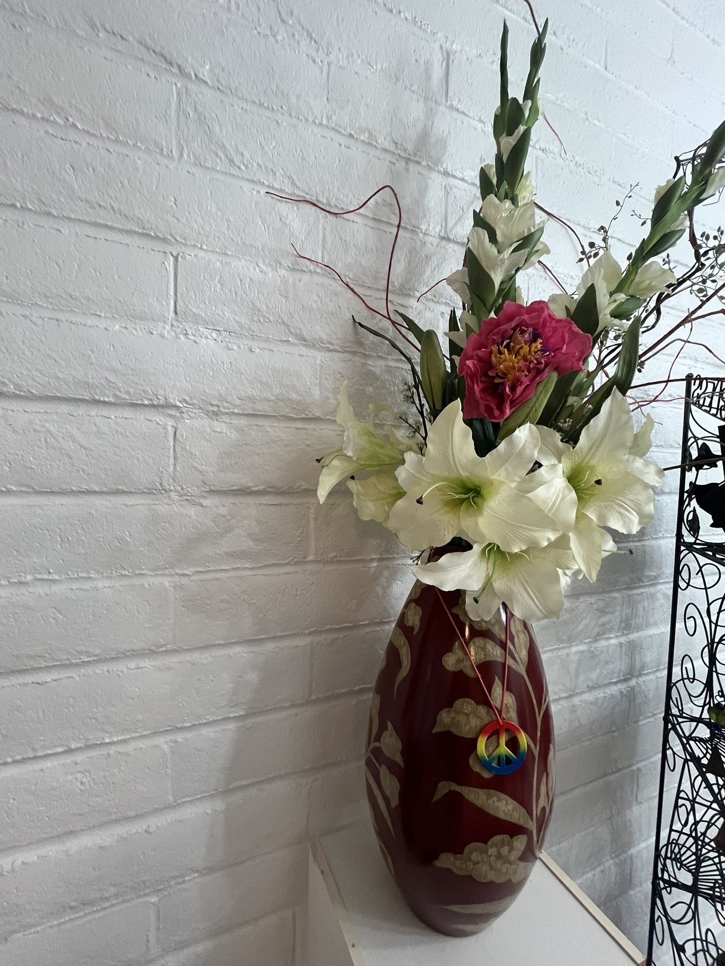 Decorative Floral arrangements In Red vase