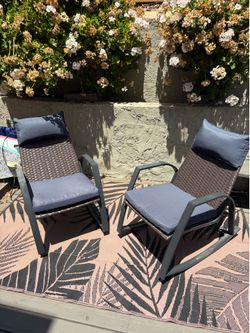 Outdoor rocking chairs (x2)