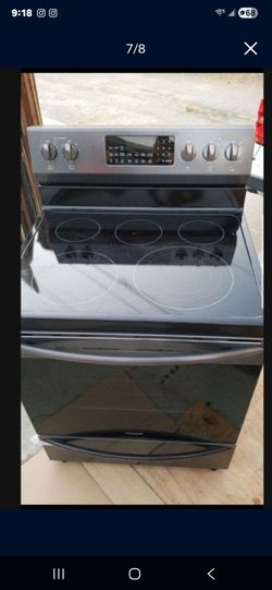 Range stove electric 220v open box new Frigidaire gallery, small dent, and tinys scratches black stainless steel