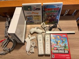 Nintendo Wii Console with Games and Controllers