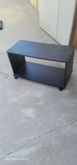 Tv Stand that holds up to a 50" Tv and a little table that needs painting