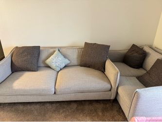 New 70-inch TV stand and two gently used sofa pieces—special offer.