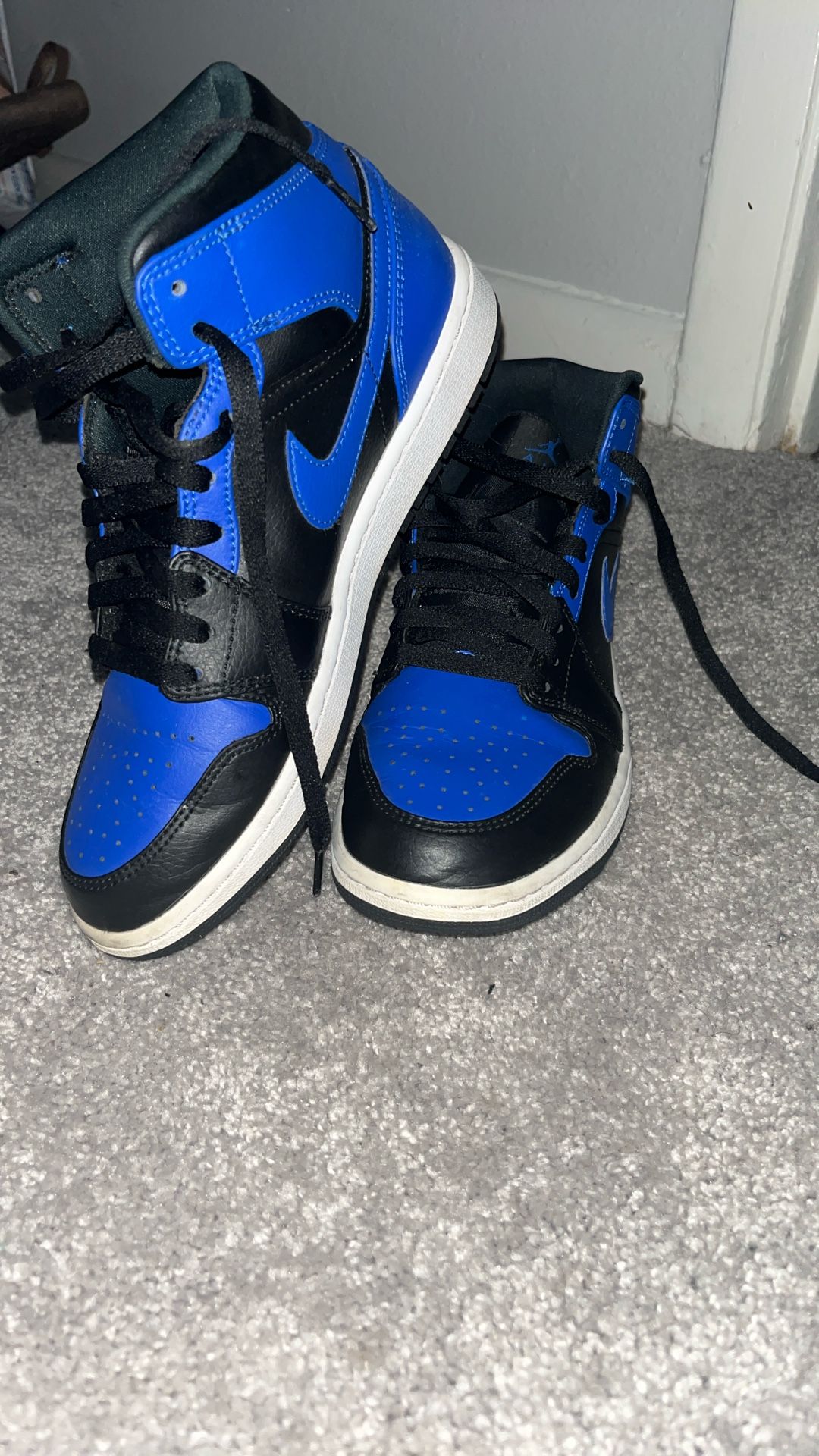 Air Jordan 1 Mid “Game Royal” sneakers.