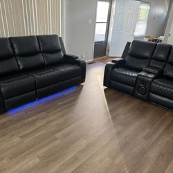 Brand New Leather Reclining Sofa And Love Seat With LED lights