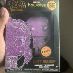 Funko Pop Pin featuring Kate Bishop from Marvel's "Hawkeye" is a limited edition Chase variant enamel pin.