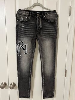 Amiri Staggered Logo Jeans Black Washed Denim