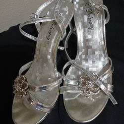 Heels.  Silver.  Size  7