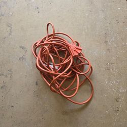 45 ft orange outdoor extension cord with triple outlet. Good for yard power tools. No cuts, works well.