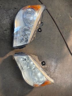 Headlights for 2012 dodge caravan