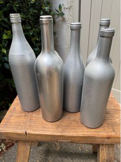 Silver painted wine bottles $2 each / $20 per dozen