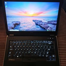 Dell Latitude 14 Inch Laptop Intel Core i7 8 GB RAM 128 GB SSD 1080P LCD DVDRW ATI Radeon Graphics Windows Professional OS 