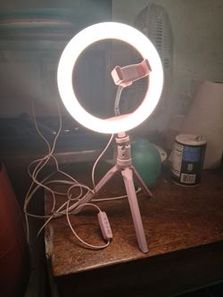 Phone stand with light