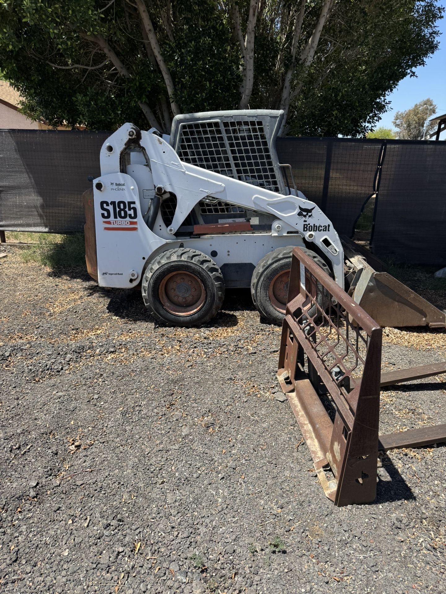 2004 Bobcat With Attachments And Trailer