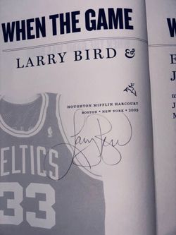 Larry Bird signed book - “When The Game Was Ours”.
