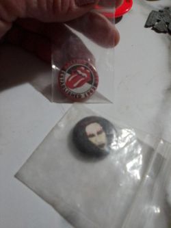 Two Collectible Buttons
