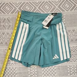 Size XS - Adidas Adizero Running Gel Pocket Shorts in a teal color with white stripes