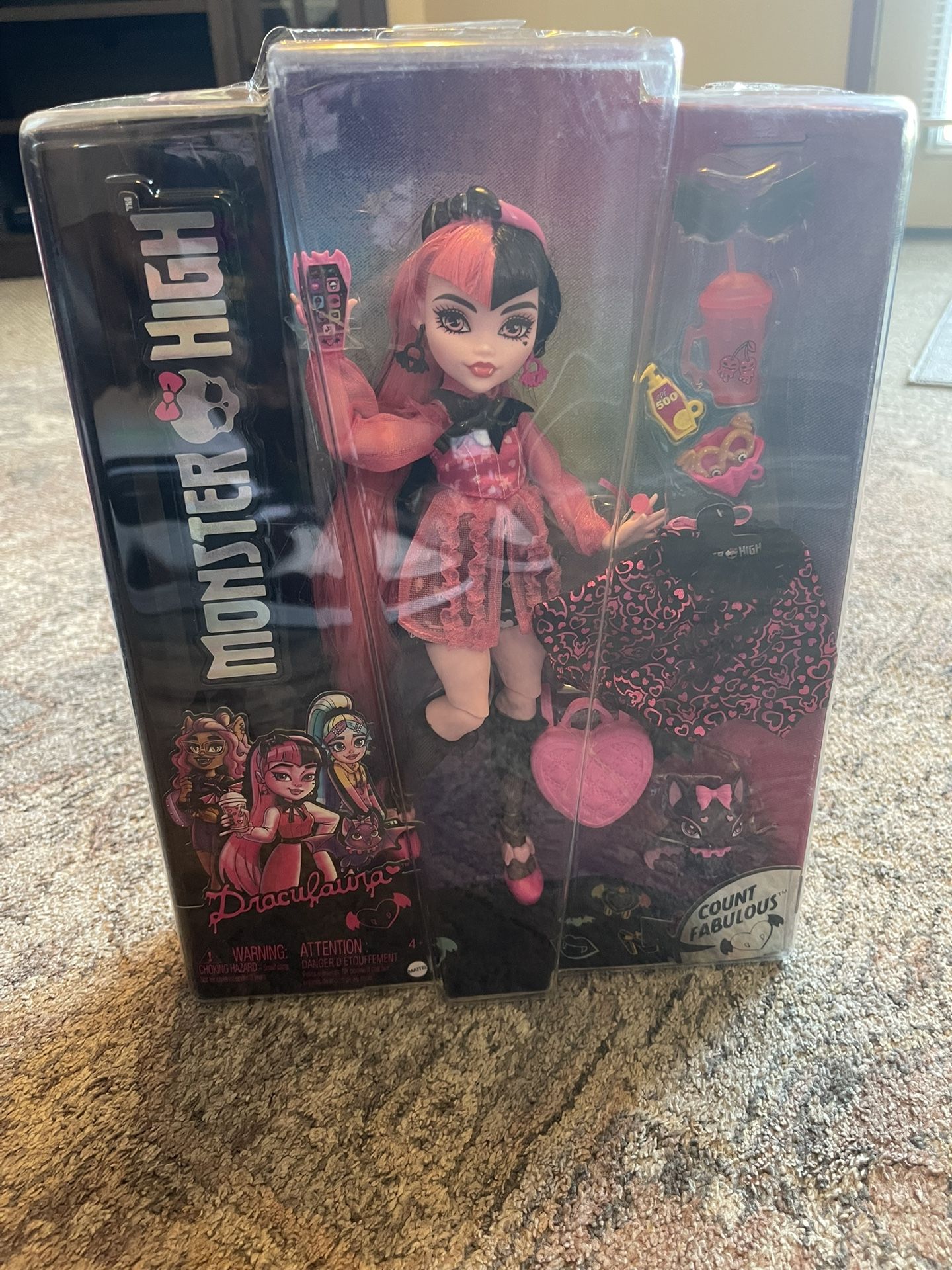 Monster High Draculaura doll with accessories.