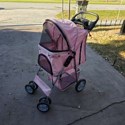 Pink pet Stroller foldable interior
Inside
23 L X 21 H X 13"W