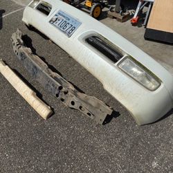 100 series Lx470 white bumper and support with all hardware 1999