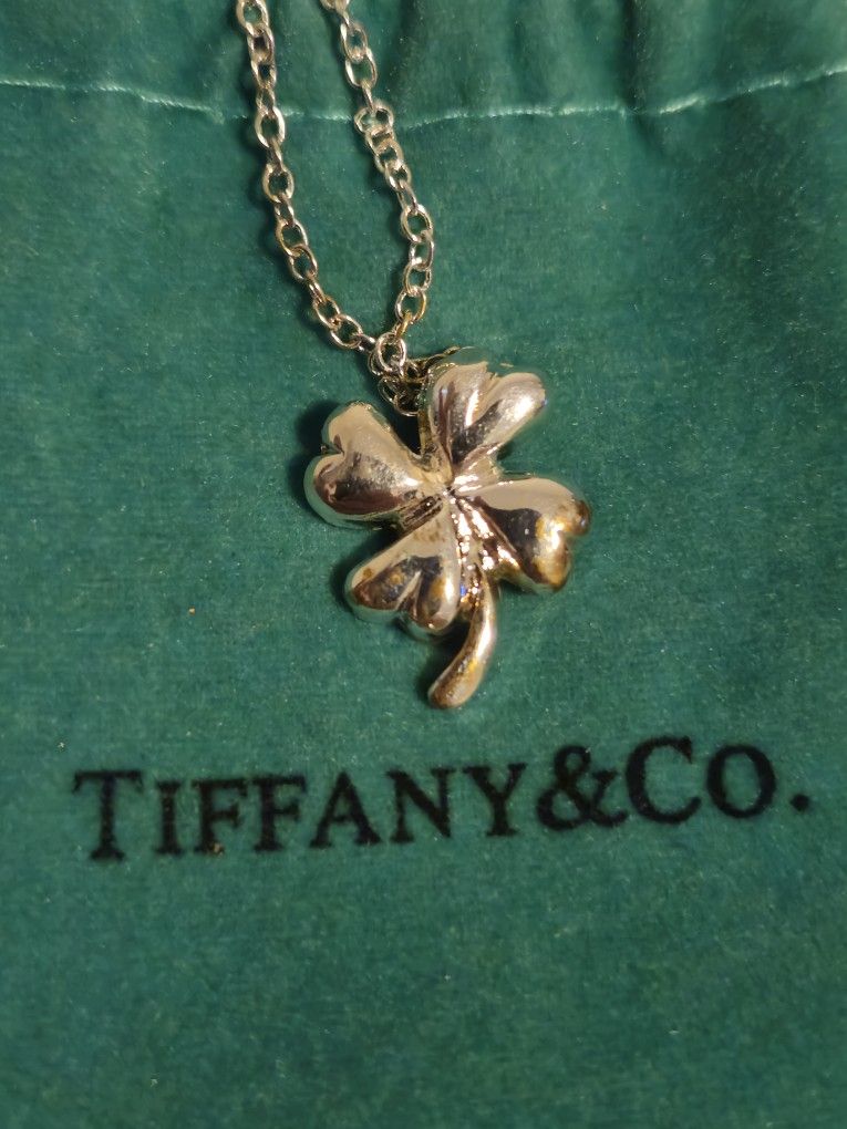 Tiffany & Co. Silver 4leaf Clover Pendant and Necklace. Comes W/Pouch