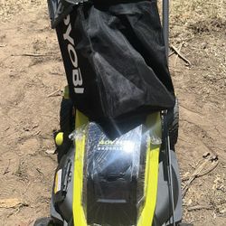 Ryobi Lawn Mower Self Propelled  21’. In  come W/1-6Ah battery and fast Charger