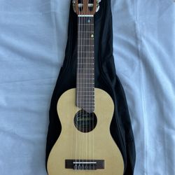 Yamaha GL1Guitalele  6 -  Nalon Strings 17” Scale Yamaha Corporation Soft Case Used Like New