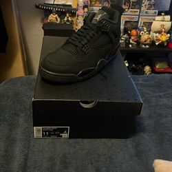 Black Cat Jordan 4’s