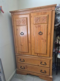 Solid Wood Armoire with Carved Detail