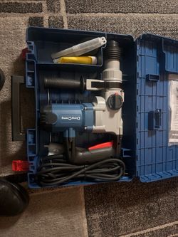 Brand new impact drill with bits
